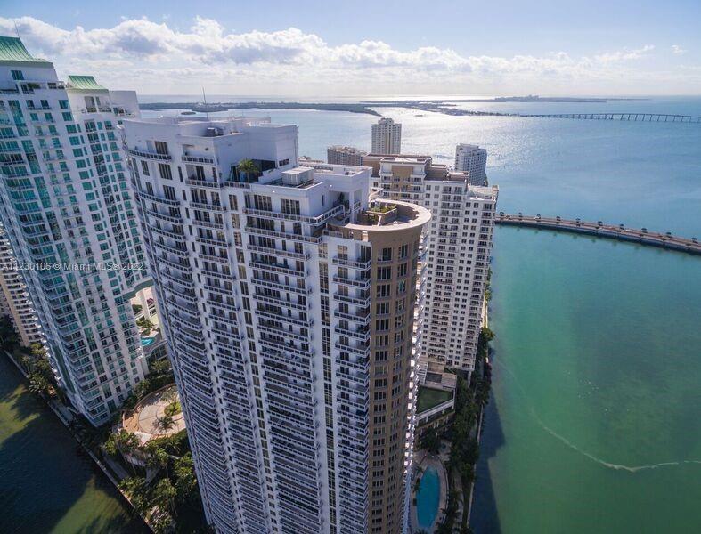 Luxurious COMPLETELY RENOVATED 1,418 sqft unit in Brickell Key.  2 Bedrooms 2 ½ bathrooms with the m