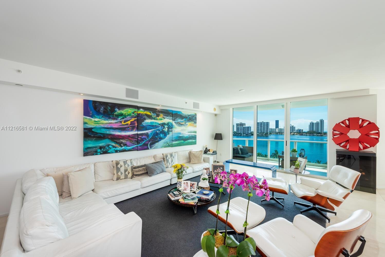 Spectacular bay and ocean views from this expansive unit at Peninsula II. This 3,464 SqFt flow-throu