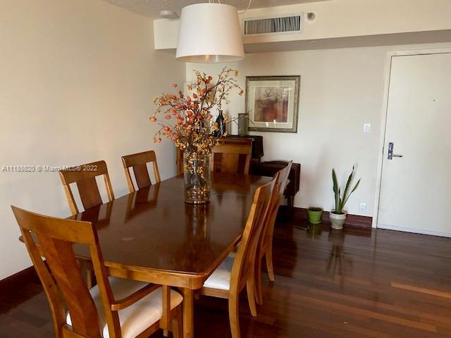 Beautiful condo, totally furnished, wood flooring, new stainless steel appliances, 2 bedrooms and 2 