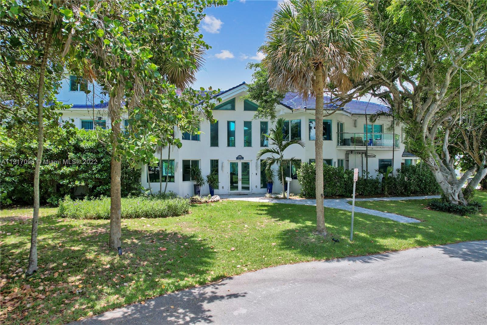 Just a short walk to the sparkling blue Atlantic Ocean, this 5-bedroom, 6 1/2-bathroom home is the i