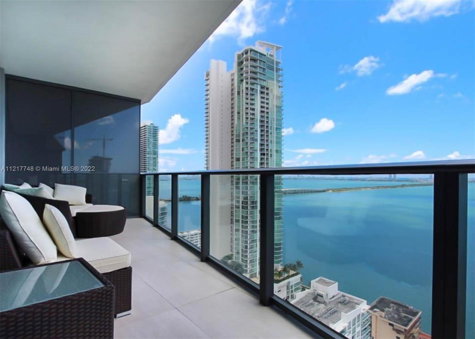 Fully furnished turnkey condo with stunning direct Biscayne Bay views. Private elevator and foyer. T