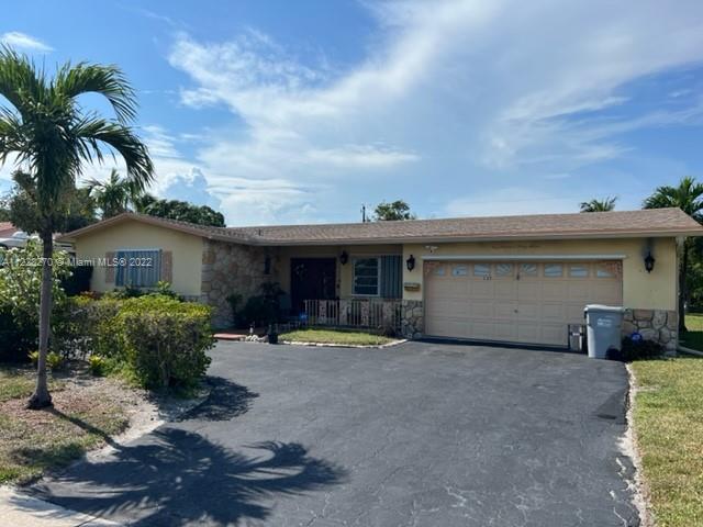 WELCOME TO MILLIONAIRE MILE in Pompano Beach. Square footage is 2,453 on over 1/3 of an acre with a 