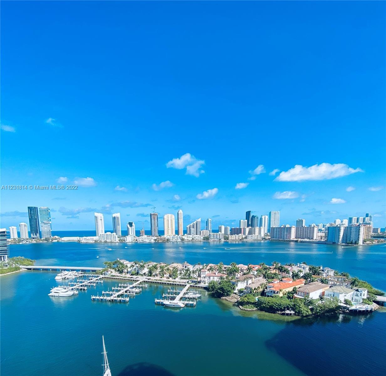 Extraordinary 2/2 plus family room with direct bay (intercoastal)  AND ocean view (sunny isles beach