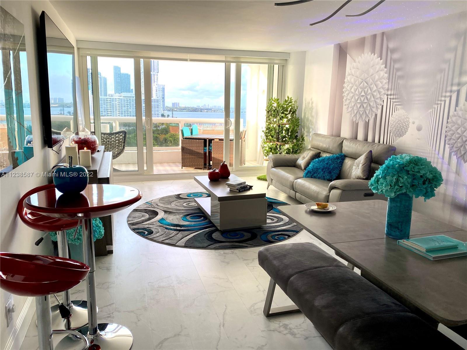 Turn-key, beautifully decorated, state-of-the-art, luxurious apartment with a stunning bay view.  To