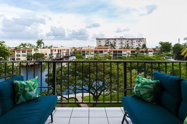 Rare corner unit with sweeping water views. Watch the boats go by as you relax on the balcony. This 