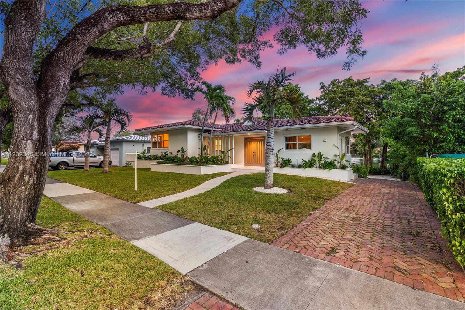 Welcome to your private updated oasis in desirable Miami Shores!  Enjoy water views from every room 