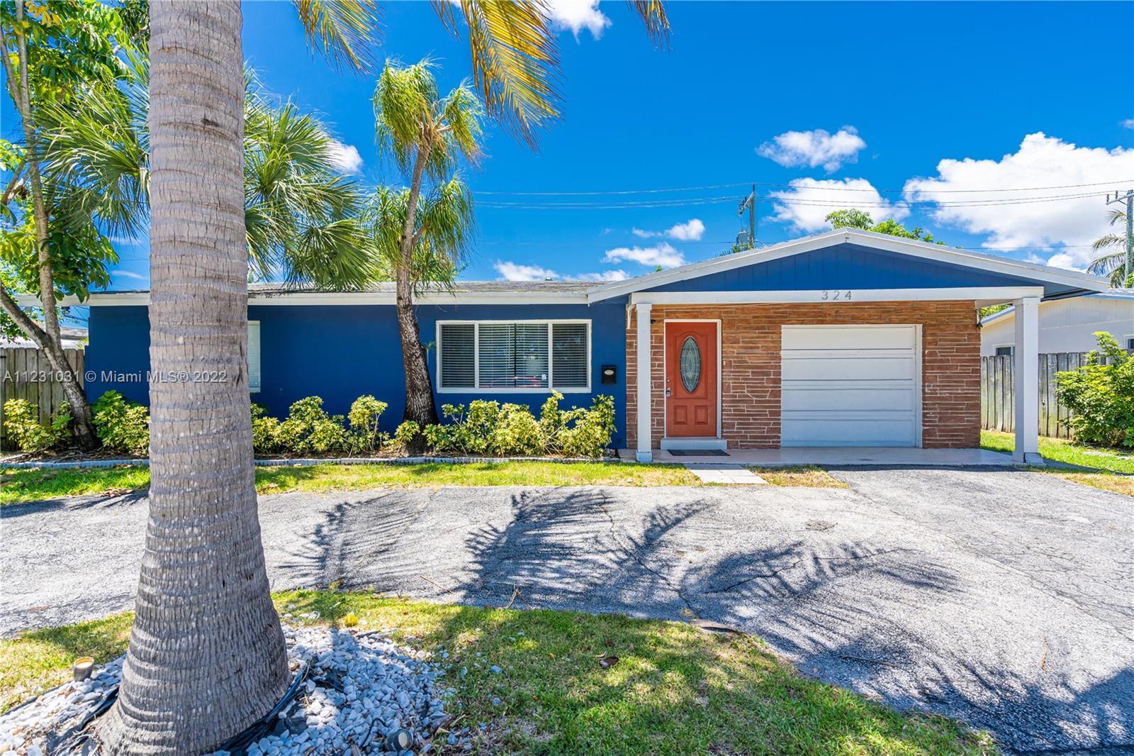 The Blue Beach House is a beautiful single-family home located in East Deerfield w/ No HOA! This hou
