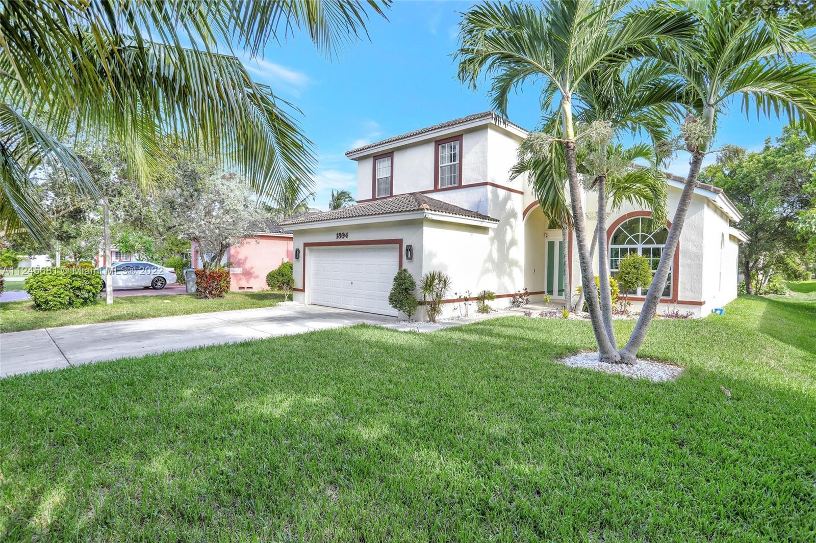 Welcome to this beautiful 2 story, 4 bedroom 2.5 bath with a 2 car garage in Pompano Beach. This bea