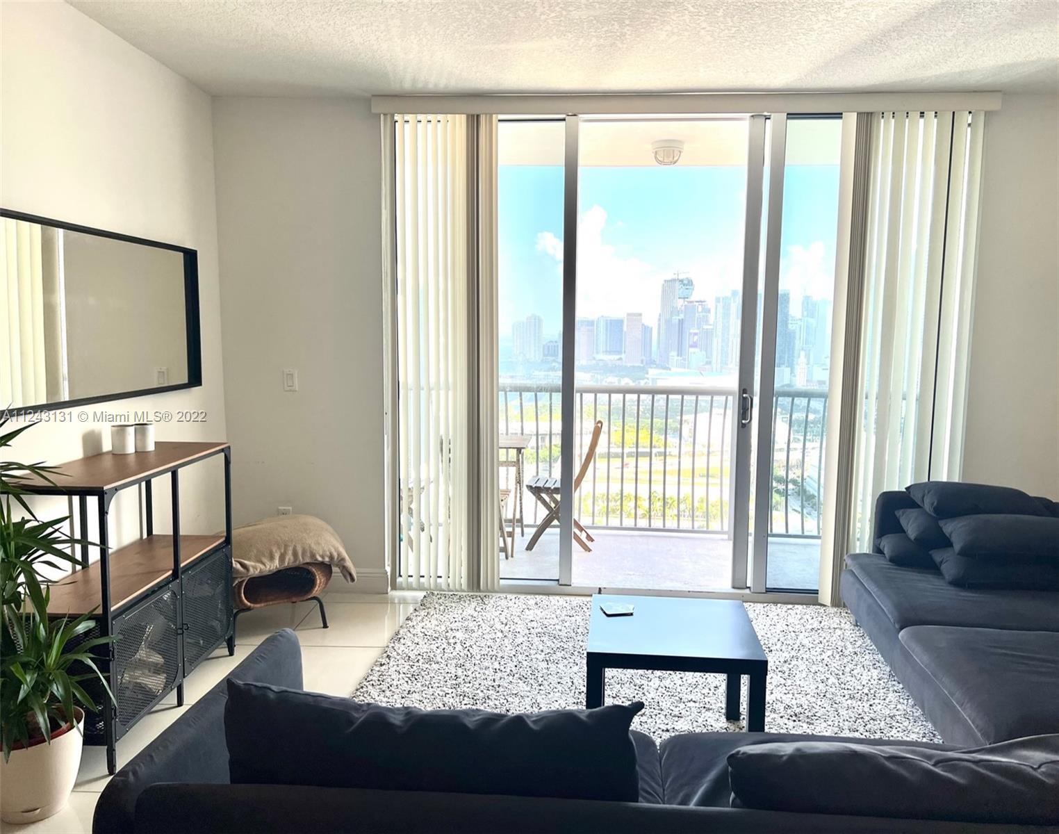 Skyline views from this studio on desirable neighborhood of Edgewater, tile floors includes 1 parkin