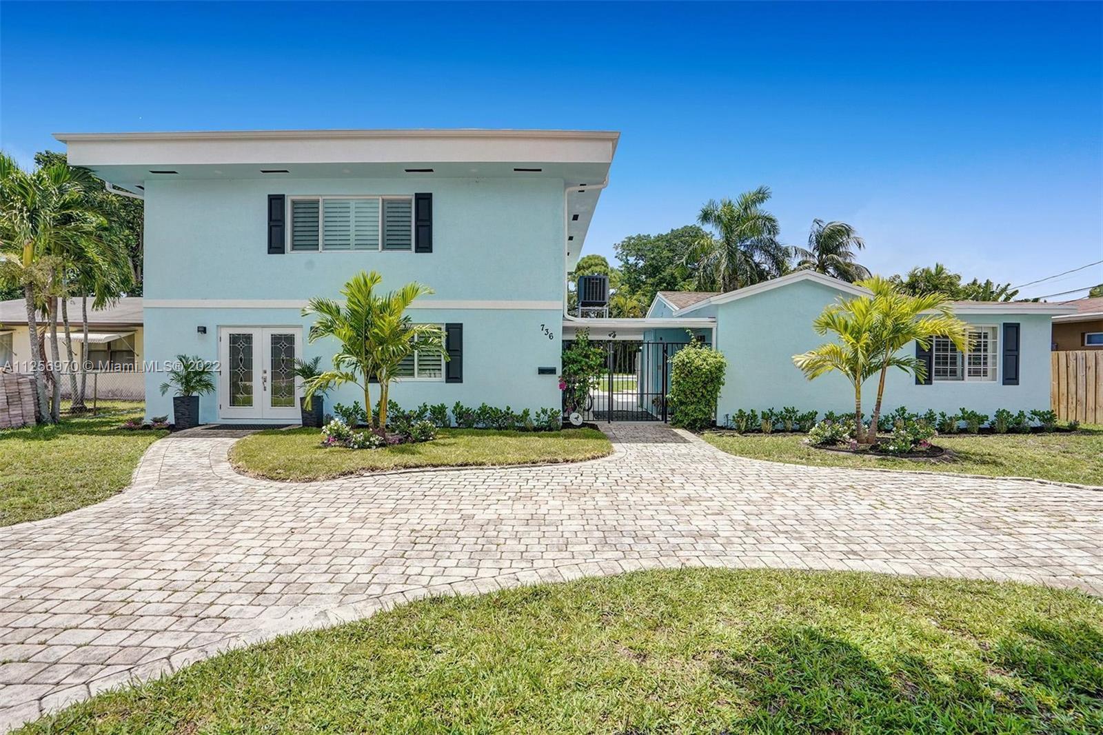 Tropical Paradise on oversized lot with guest house! Amazing Beautiful two story home just minutes f