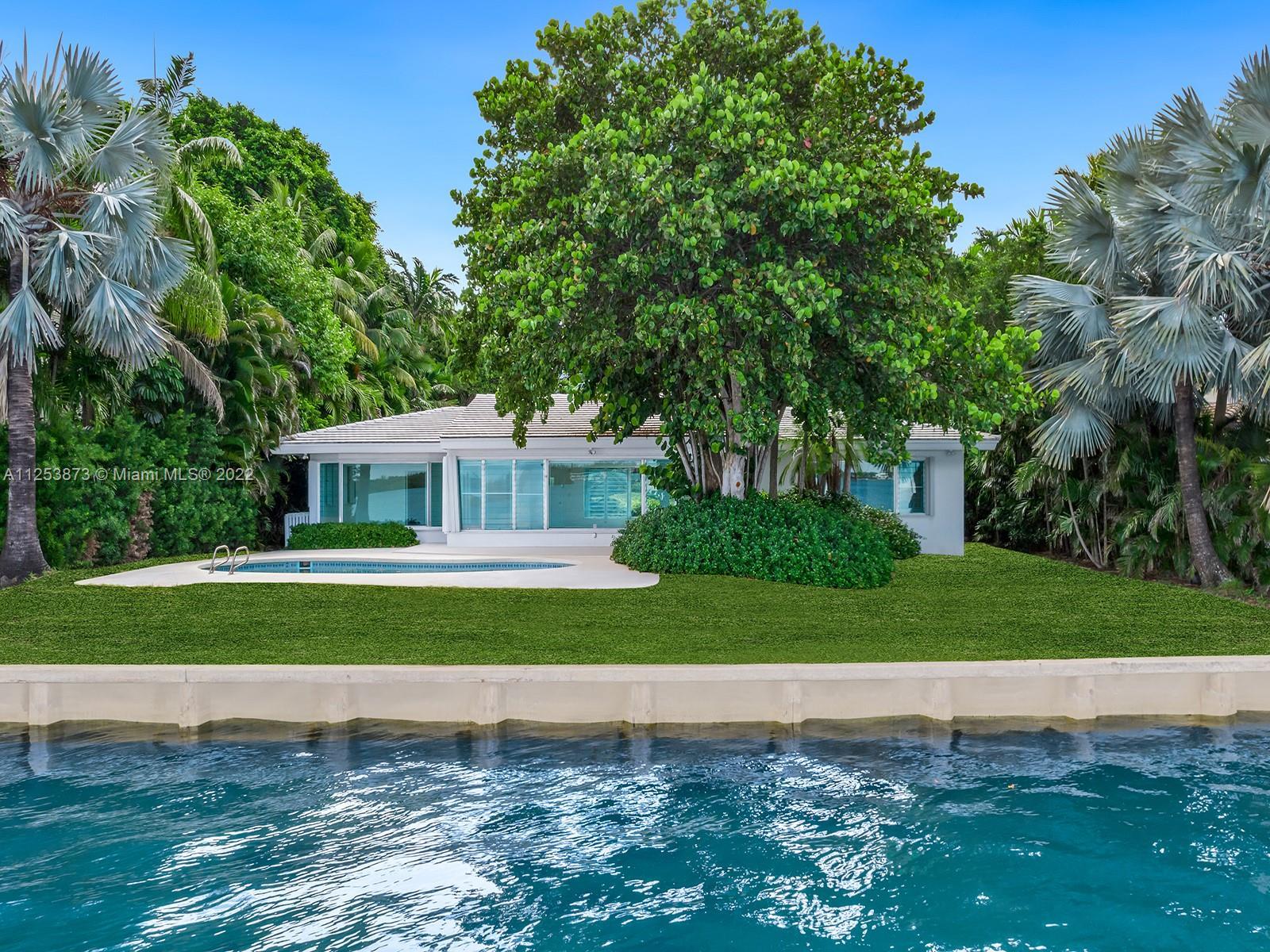 This trophy bayfront property in the exclusive gated community of Bal Harbour Village offers expansi