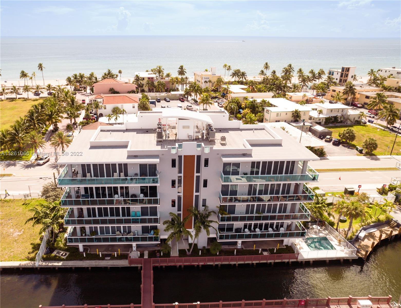 LUXURY WATERFRONT CONDO WITH 60' BOAT SLIP LOCATED IN THE HEART OF HOLLYWOOD BEACH. Sky Harbor is an