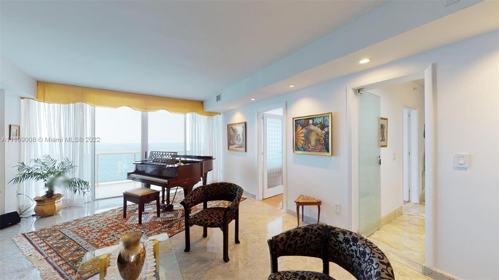 THE PINNACLE AT SUNNY ISLES BEACH A SHIMMERING LANDMARK OF ELEGANCE RISING ABOVE THE WHITE SANDS OF 
