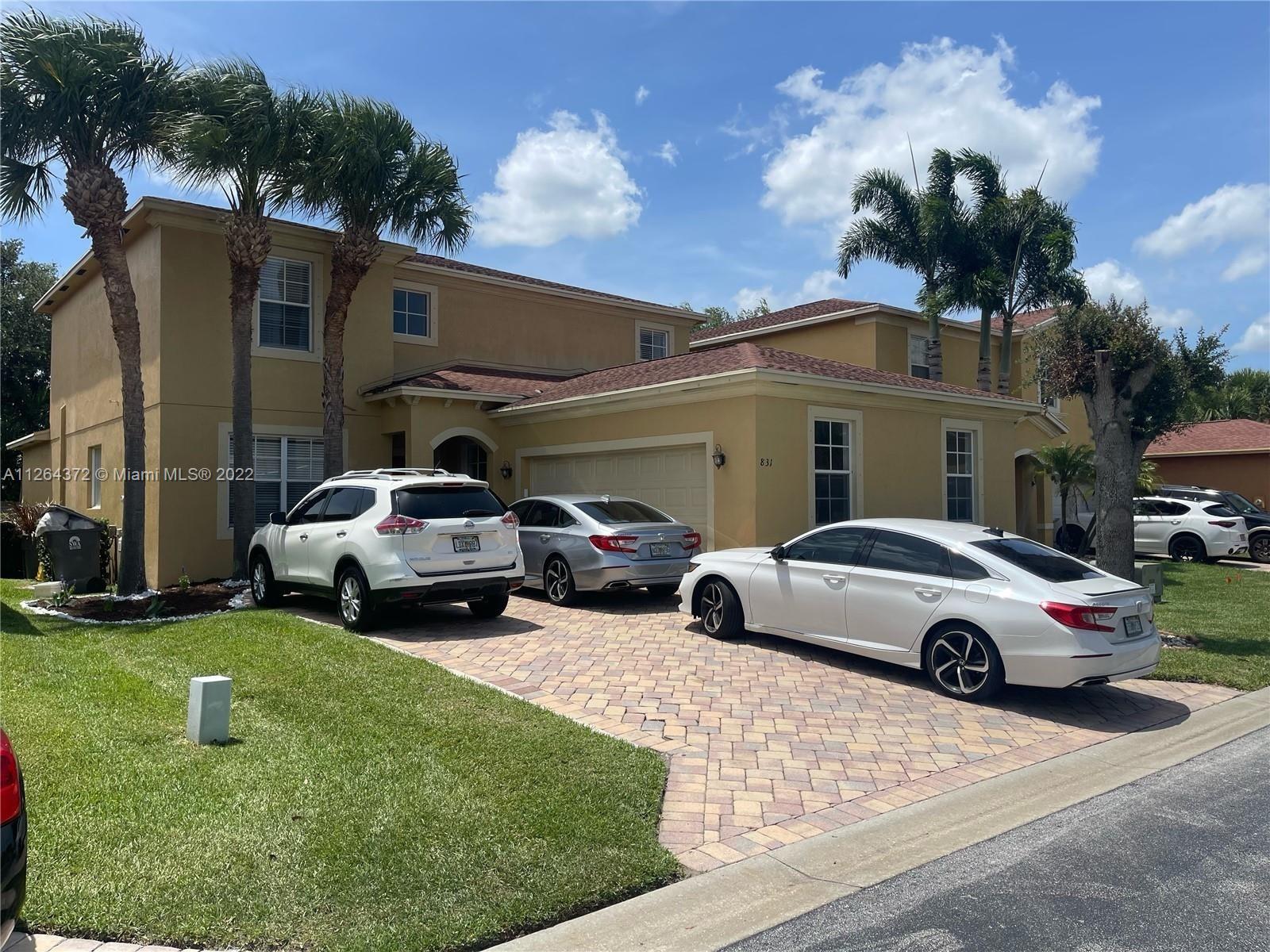 BEAUTIFULLY UPGRADED 2-STORY SINGLE-FAMILY HOME IN THE QUIET SUNTERRA COMMUNITY IN WEST PALM BEACH. 