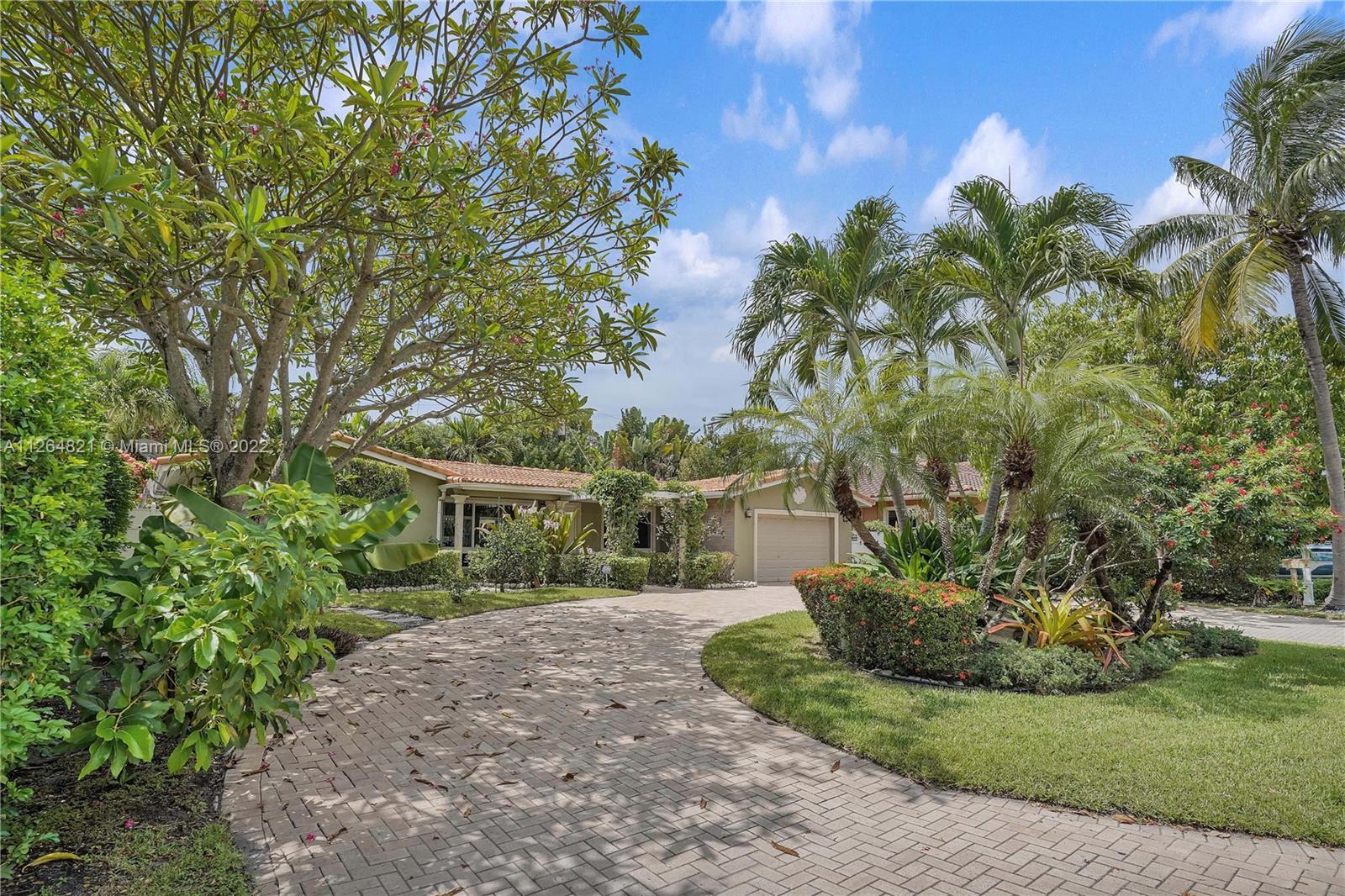 BEAUTIFUL MOVE IN READY BEACHSIDE HOME WITH WELCOMING GARDENS. THIS 3/2 UPDATED HOME HAS IT ALL. WIN
