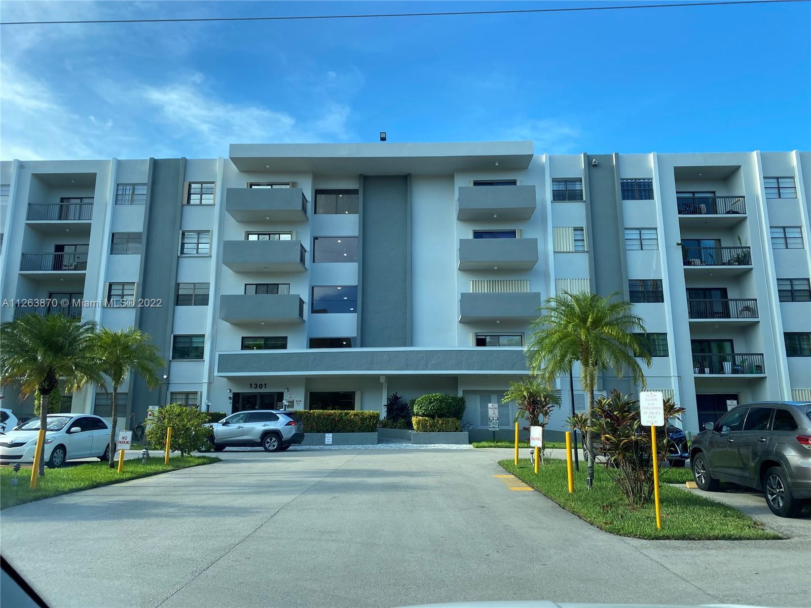 LIVE IN THE HEART OF HALLANDALE BEACH. FIRST FLOOR UNIT EASILY ACCESSIBLE. VERY SPACIOUS UNIT, TILED