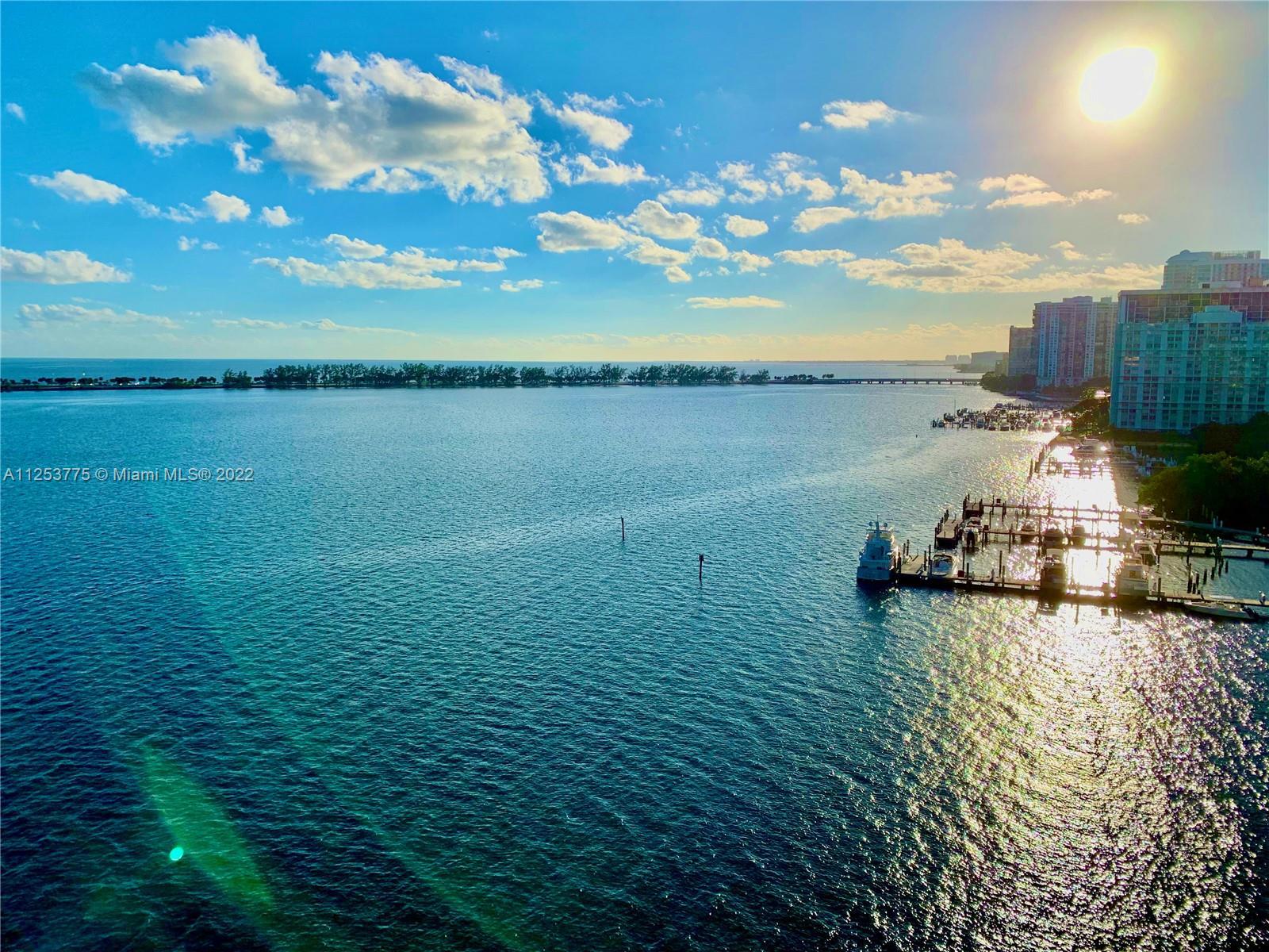 Completely Remodeled corner unit, with open Balcony and breathtaking Biscayne Bay water views from e
