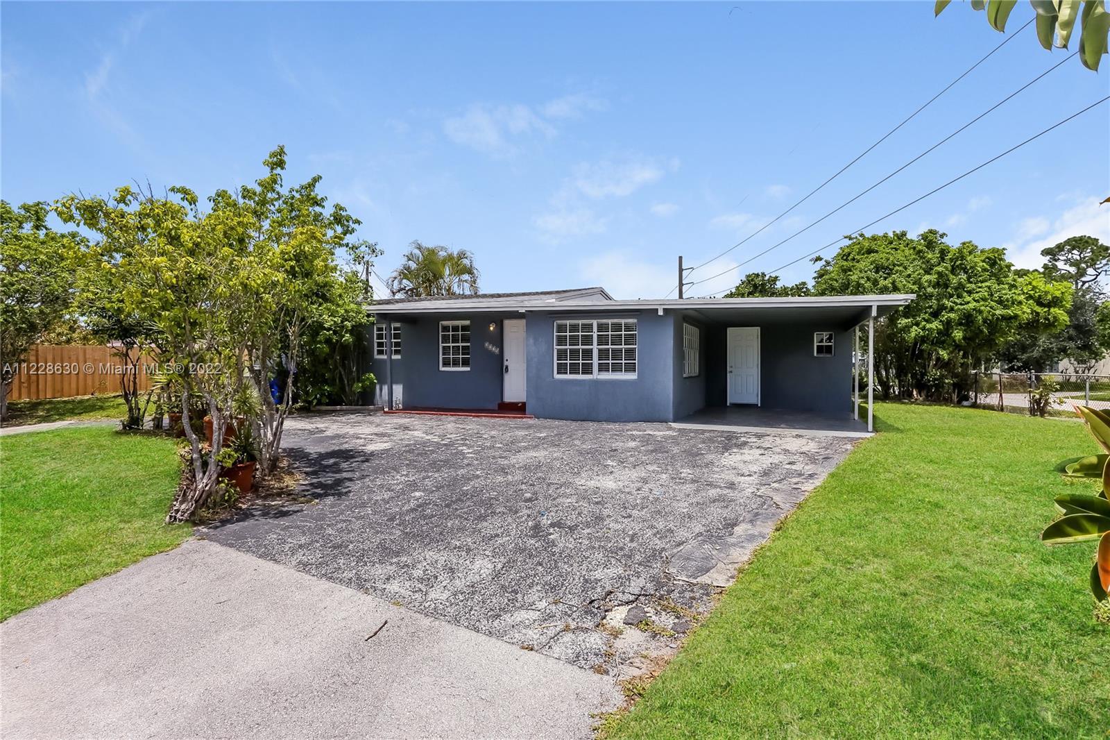 This recently renovated East Pompano 3/2 sits on a corner lot. It is conveniently located just minut