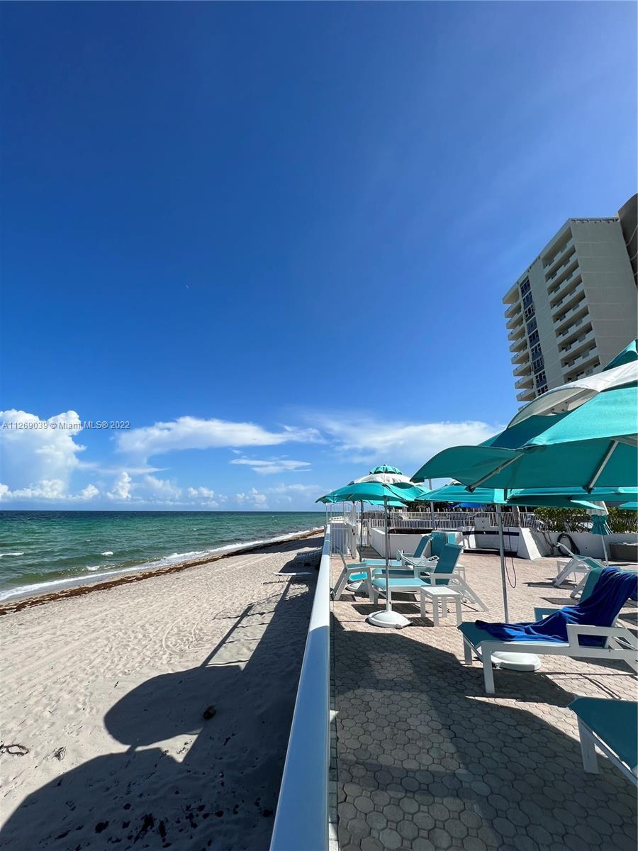 Enjoy beautiful sunsets in a condo with the beach in front, resort style,  completely remodeled , re