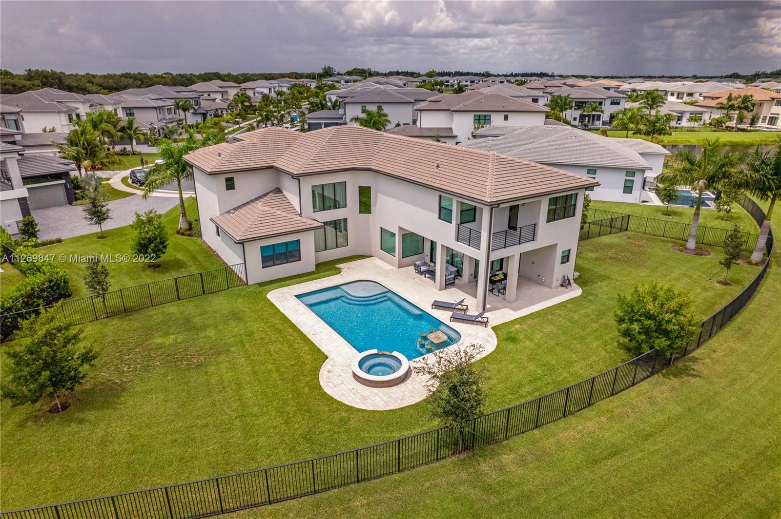 Turn Key - Furnished Contemporary Home located at the sought gated community of Boca Bridges in Boca