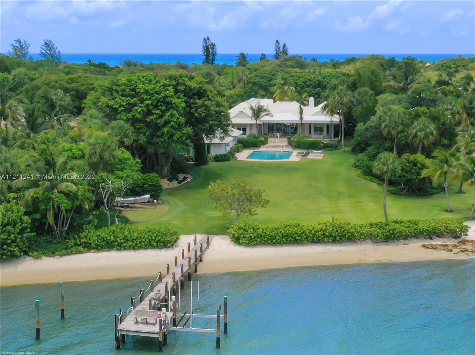 A rare Intracoastal-to-Ocean estate with deeded beach access available on Jupiter Island. The proper