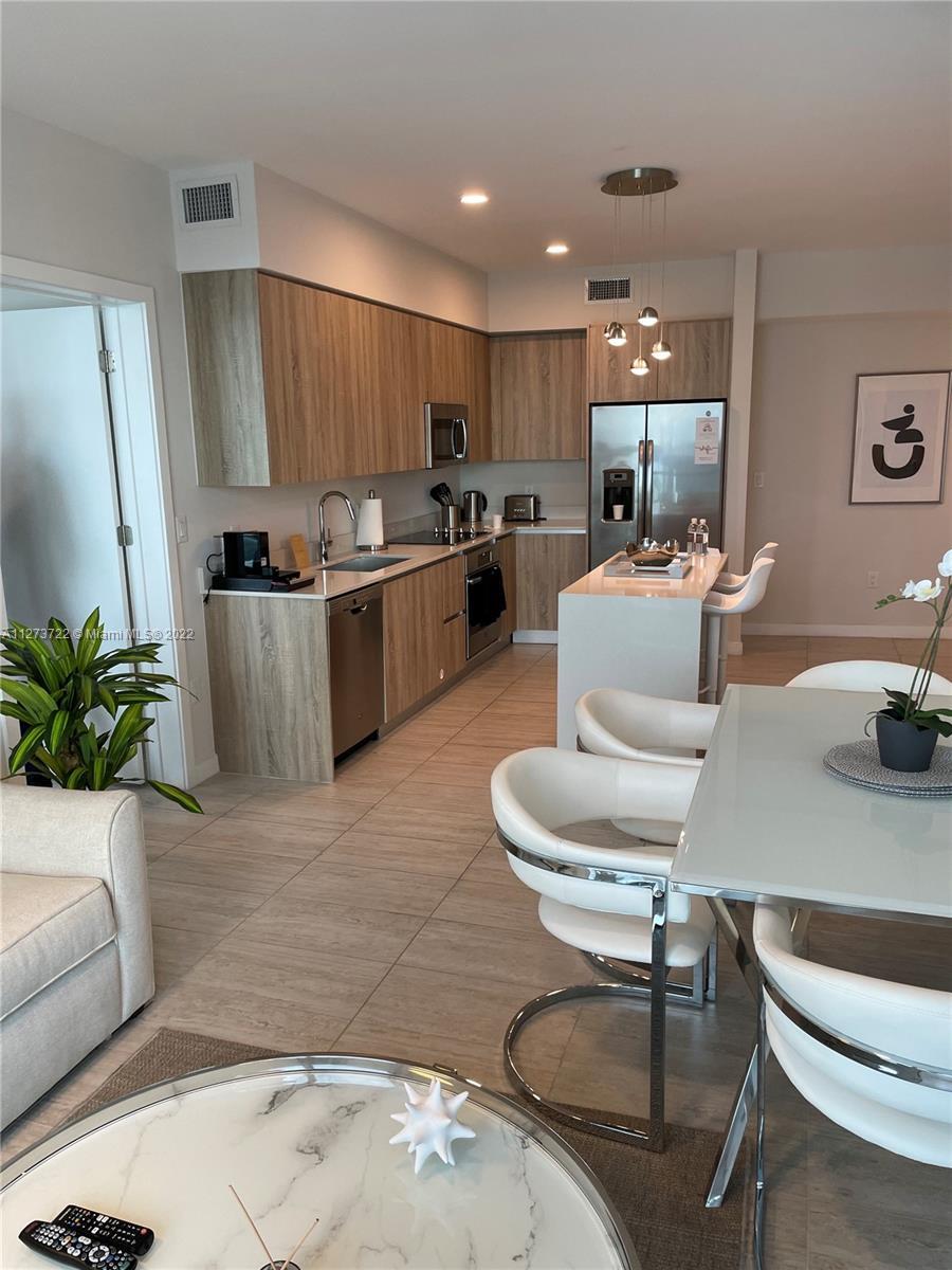 Totally Furnished!!! 2 bed 2 bath unit located in Miami Design District. Ceramic floors though out t