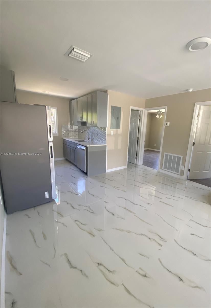 1561 NE 27thCT POMPANO BEACH ,FL,33064 - one family home for sale.A Beautiful totally renovated hous