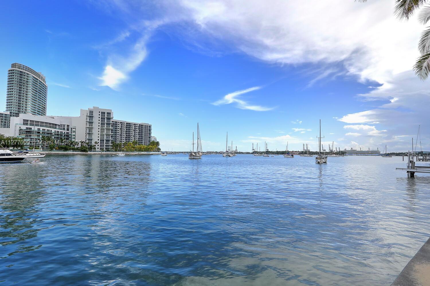 Live on Belle Isle, a beautiful island in Biscayne Bay, ideally located between Miami & Miami Beach.