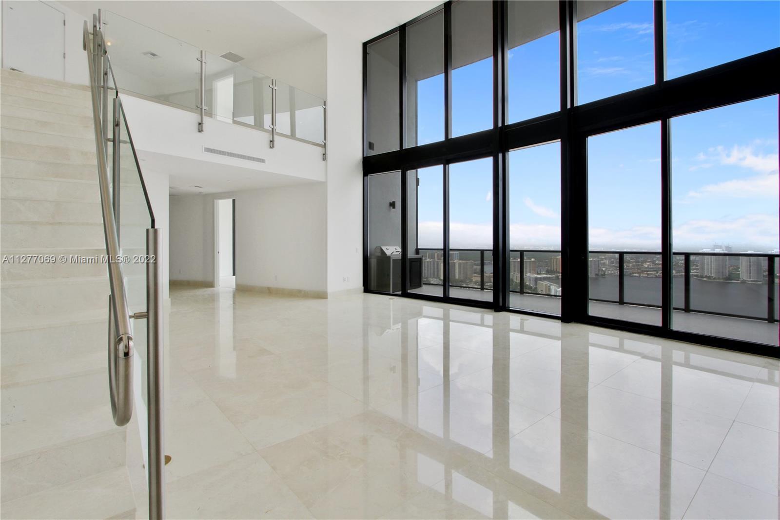 One of the few duplex residences with dramatic 22ft ceilings. Duplex are only 40th floor and up. 
T