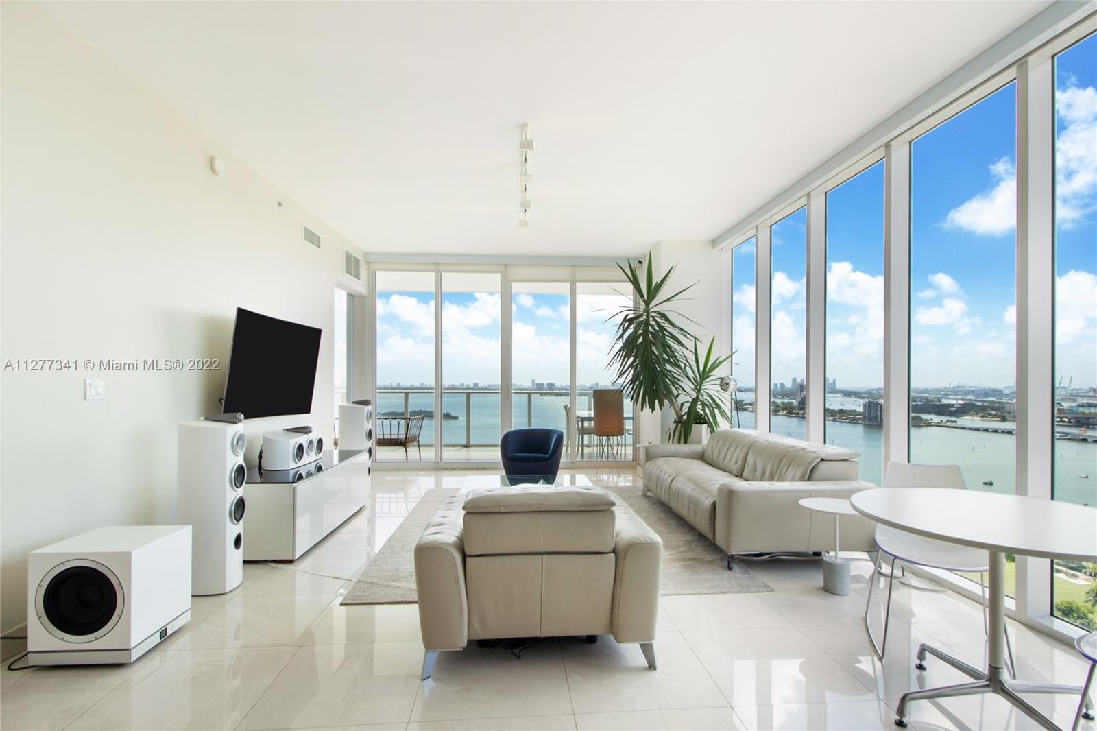Enjoy UNOBSTRUCTED Bay and City views from this gorgeous SE corner unit at ultra-luxurious Paramount
