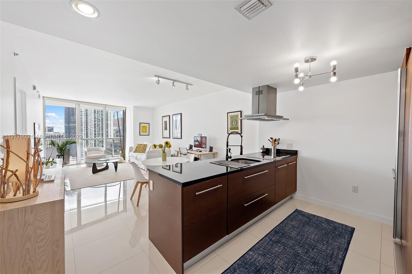 Enjoy stunning water views from this 40th floor oversized 1 bedroom unit at Icon Brickell Tower 2. F