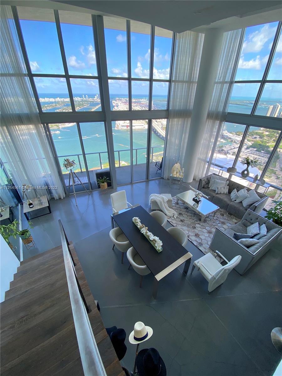 This is your opportunity to own a UNIQUE CORNER TRI-LEVEL PENTHOUSE in the heart of Miami. This amaz
