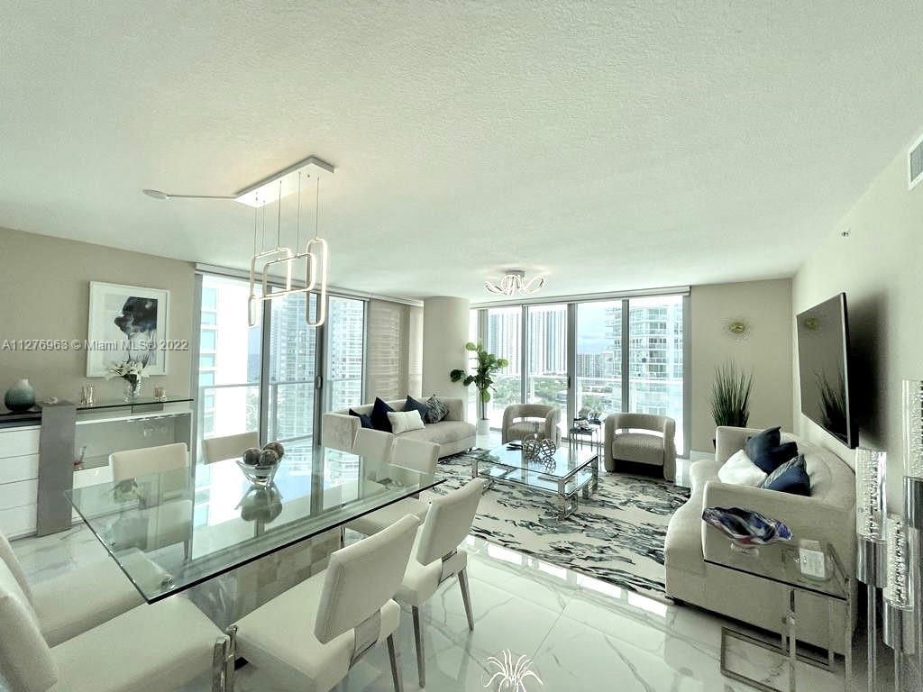 Stunning BRIGHT and open concept corner unit at Parque Towers in Sunny Isles within walking distance