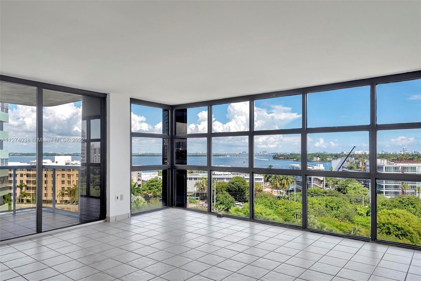 This rarely available "15" line corner unit has all the views: wide bay, lush park and the dazzling 