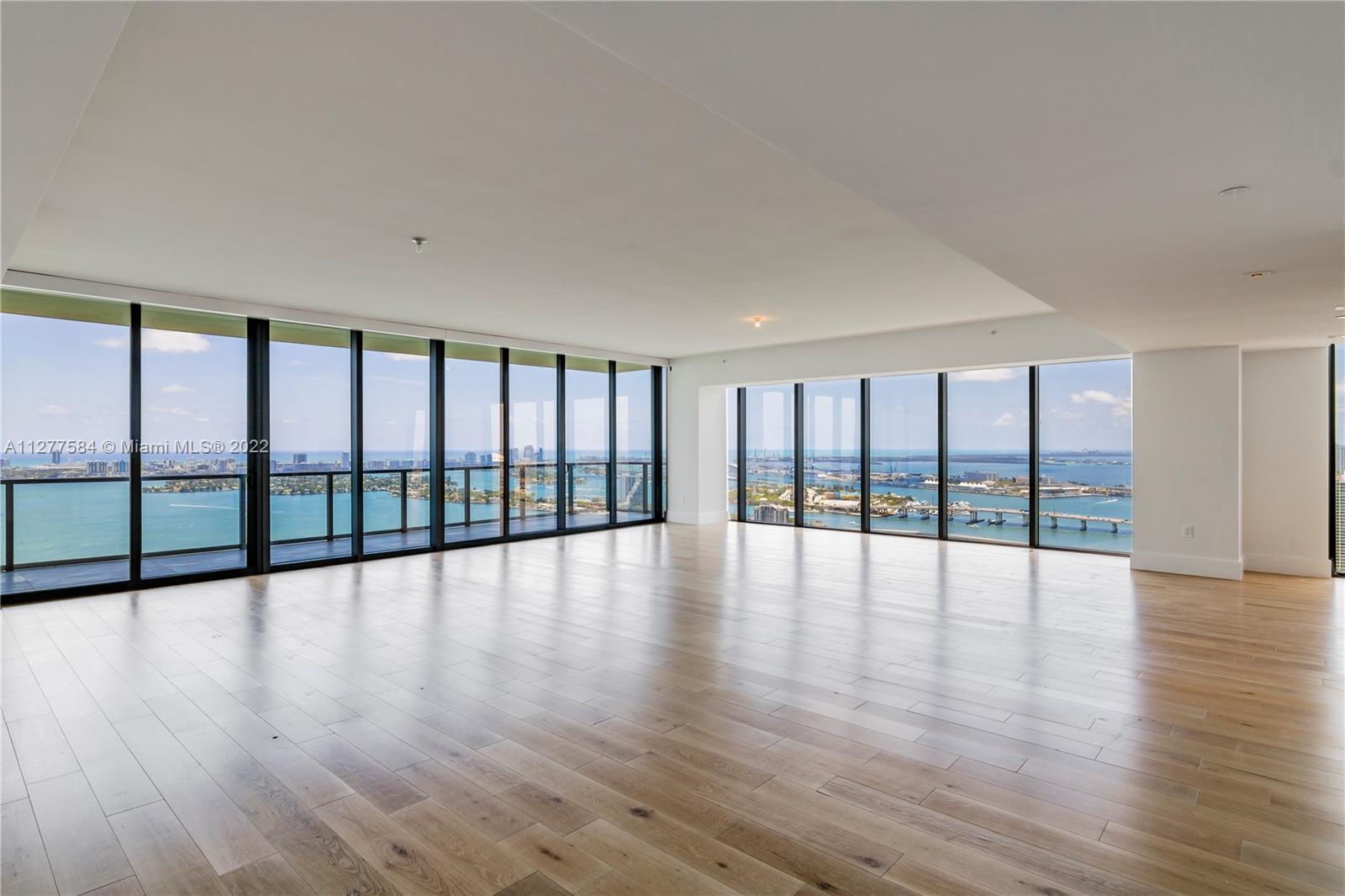 The minute you walk in the views take your breath away. Oversized living room with panoramic ocean a