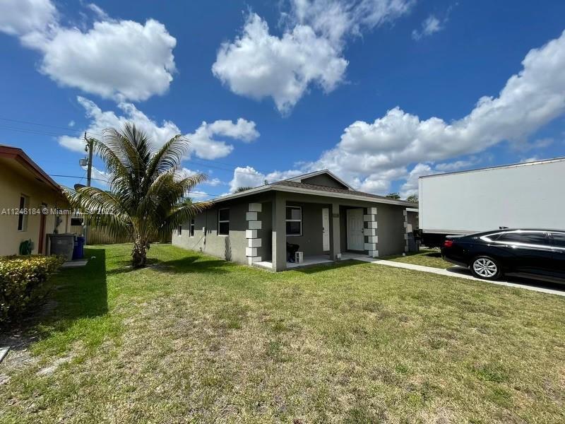 3 bedrooms, 2 bathroom home in Pompano Beach, with a small storage room in the front of home. Ample 