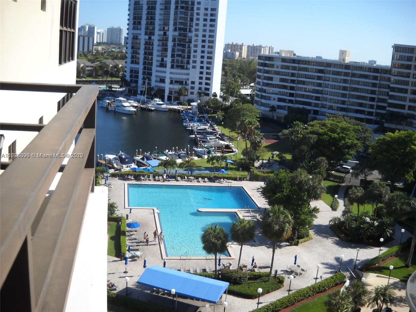 This huge 2 beds and 2 baths offers completely tiled bright views overlooking pool and green area. V