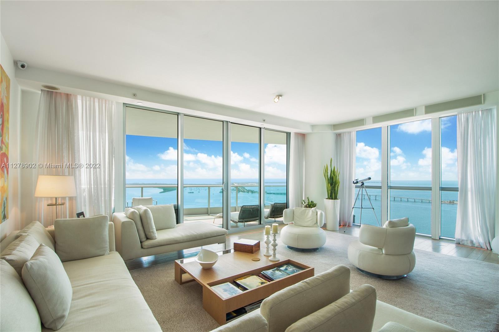 Spectacular wide bay and ocean views from this spacious 4BR/4.5BA SE corner unit at Jade Brickell. E