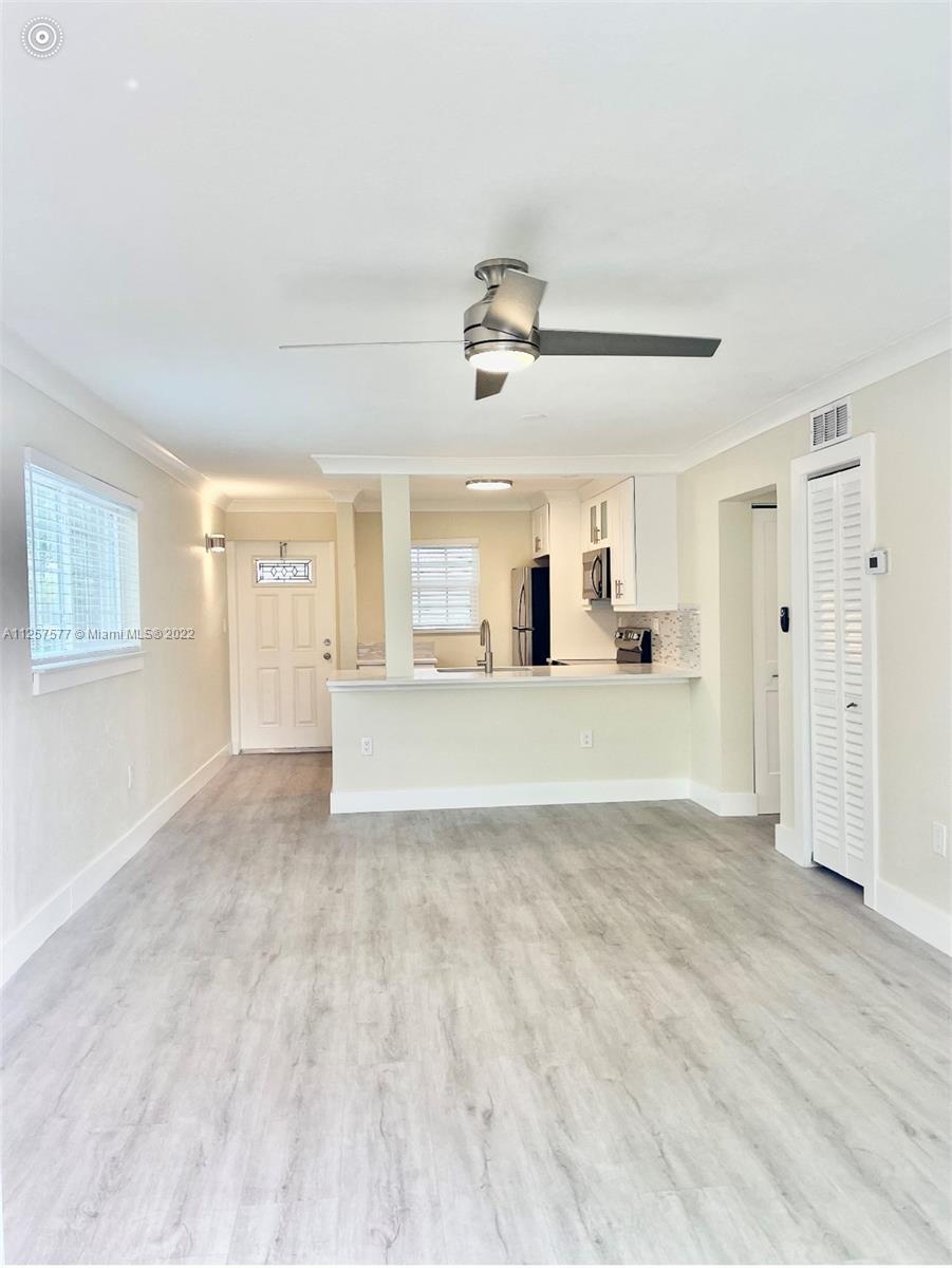 Beautifully Remodeled and spacious 2-bedroom 1 bath corner unit full of natural light with a private