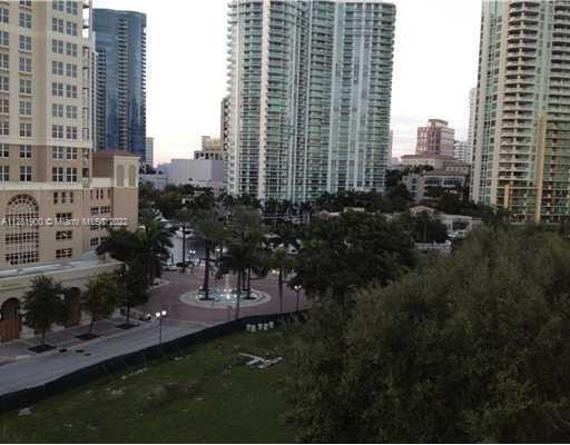 Bright corner unit with partial river & city views from the unit & balcony. WOOD FLOORS THROUGH OUT 
