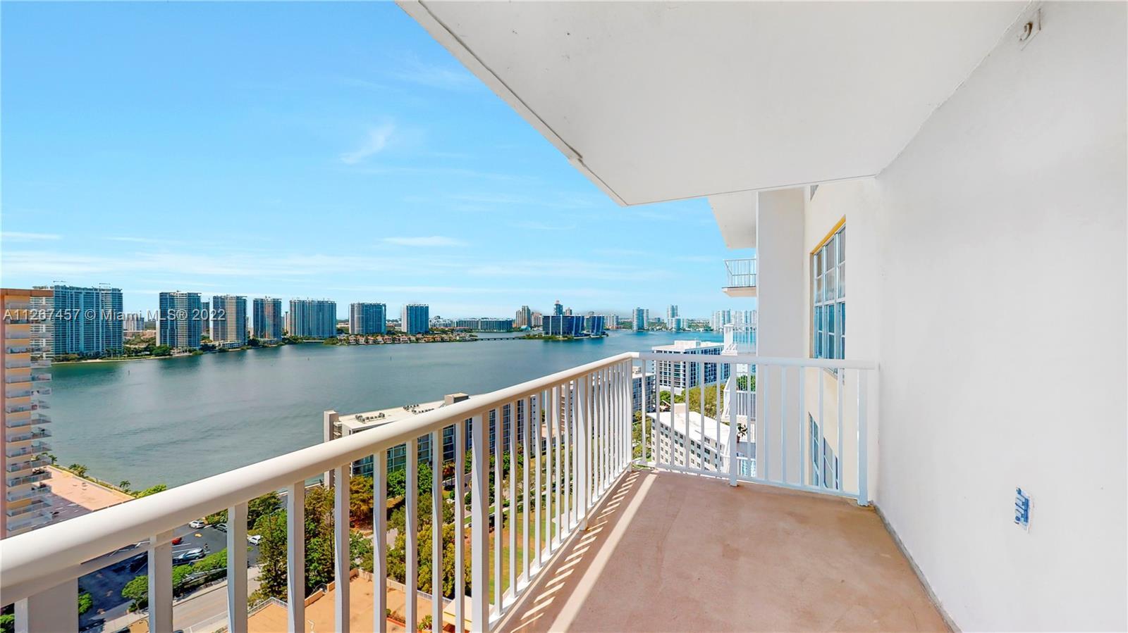 STUNNING CORNER RESIDENCE WITH OCEAN AND BAY VIEWS.  LOCATED ON THE S/W CORNER OF THE BUILDING THIS 