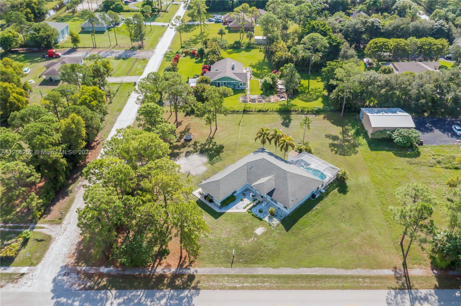 Amazing and immaculate Ranch style home in prime location of the Loxahatchee area on the Acreage, fe
