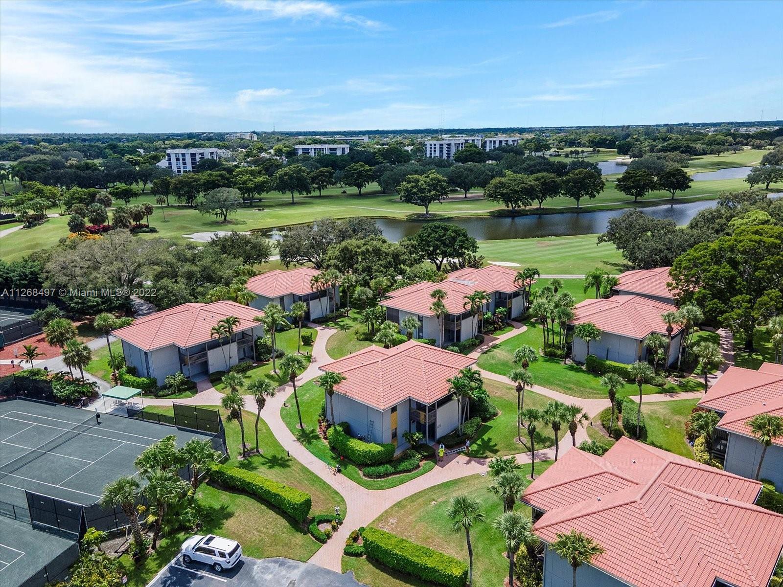 Spectacular renovated and bright Courtside Condo.  Located at Boca West Country Club.  This spacious