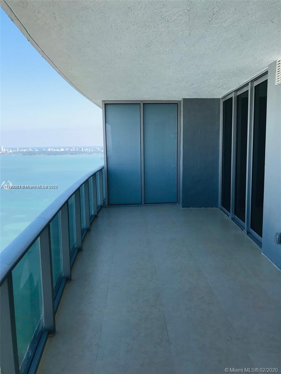 Spectacular View to the Bay and Miami Beach from this 44th Fl, Spacious 1 Bed + DEN (Converted to a 