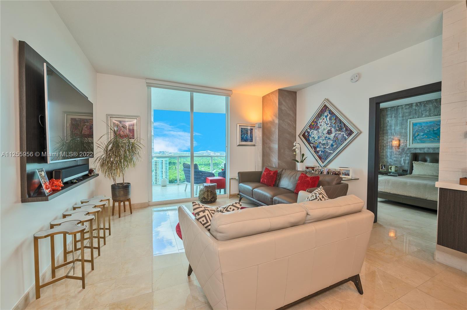 ENTER THIS FABULOUS STATE-OF-THE-ART RESIDENCE SHOWCASING THE BEST BAY AND OCEAN VIEWS IN BRICKELL! 