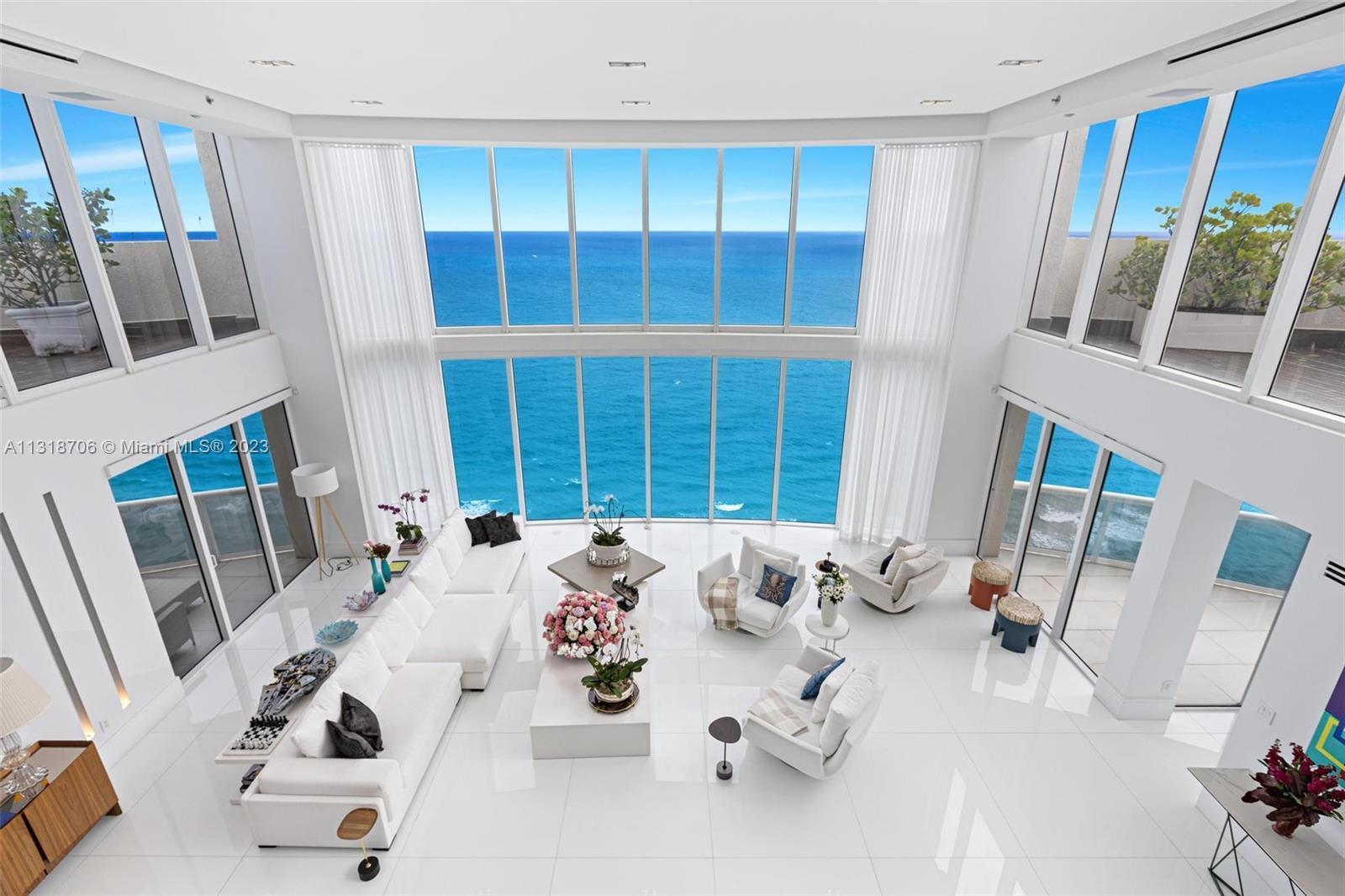 ONE OF A KIND, MANSION IN THE SKIES IN SUNNY ISLES WITH 180o OCEAN VIEWS. 
THIS IS A UNIQUE SKI-VIL