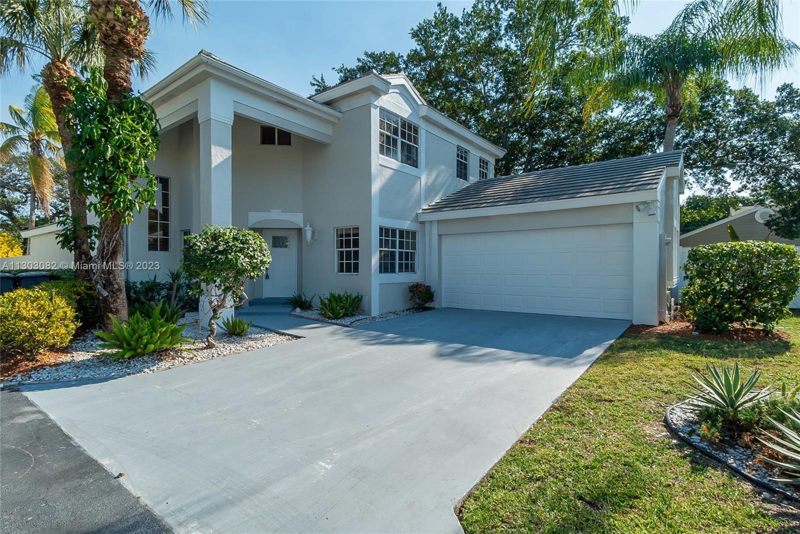 This charming residence is situated in the heart of Boca Raton and boasts five bedrooms and three fu