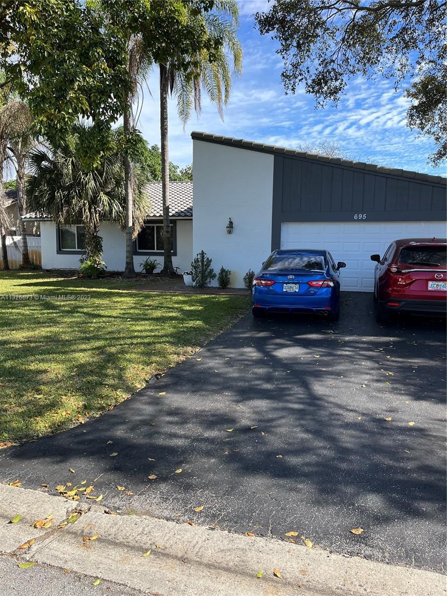 Photo of 695 NW 100th Ln in Coral Springs, FL