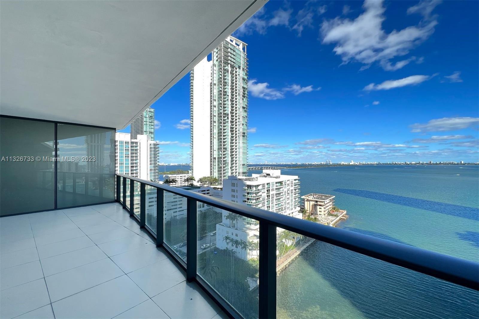 Breathtaking direct views of Biscayne Bay and Miami Beach. Impeccable 2 bed 2 baths, private elevato