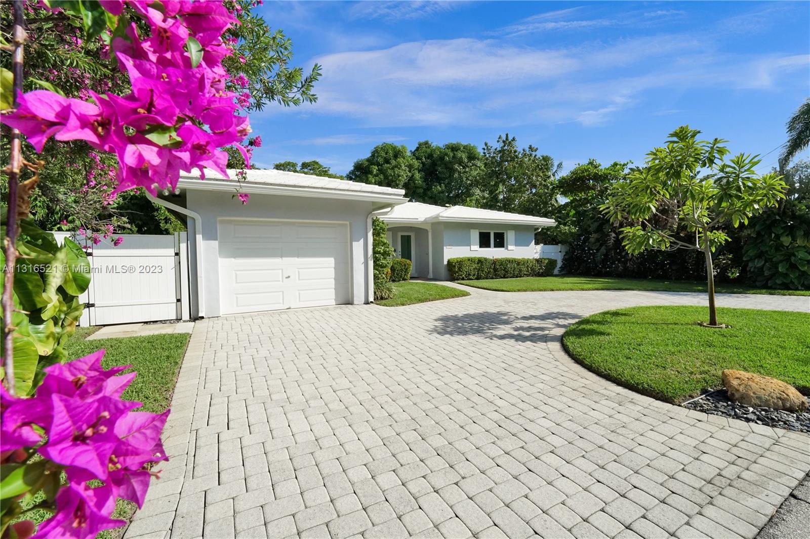 Just 5 blocks to Wilton Drive & TOTAL privacy with mangrove preserve directly across the gentle wate